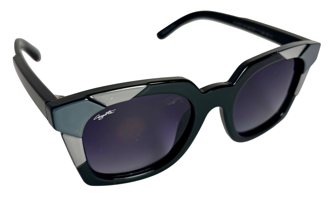 Sunglasses with black frame and dark lenses on a light gray background